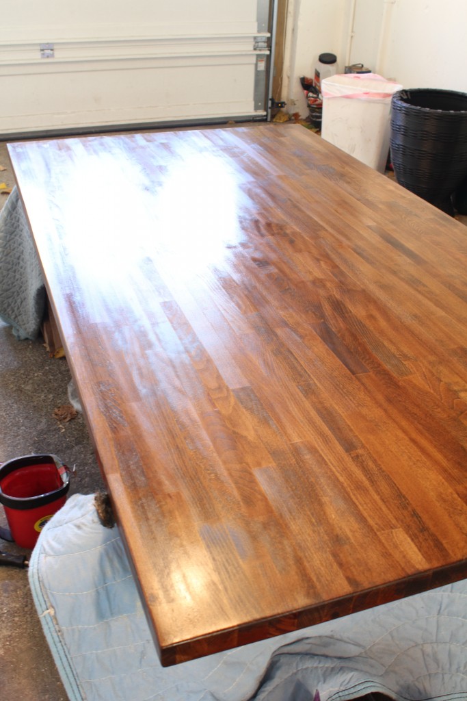 DIY dining table; stained butcher block with a metal base